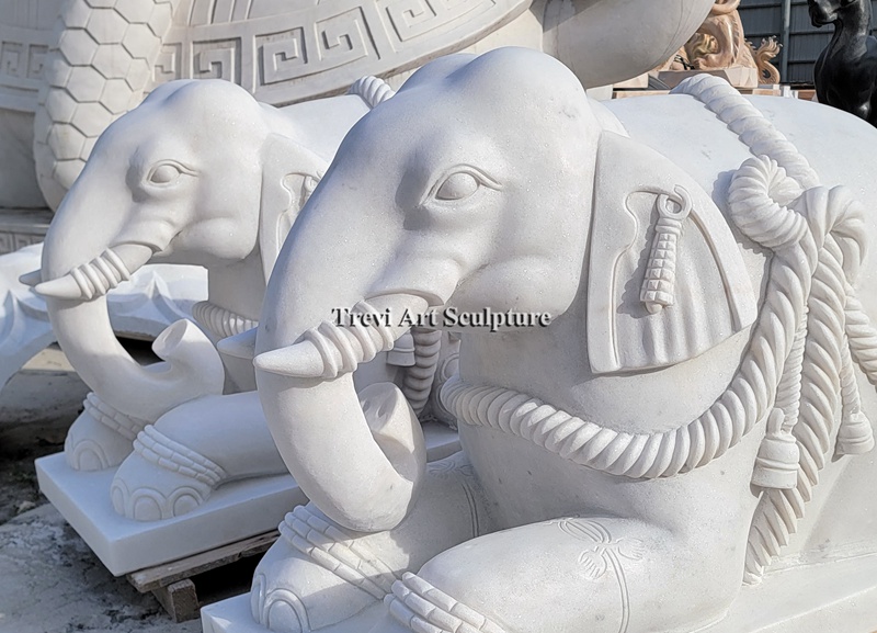 pair of sitting elephant statues