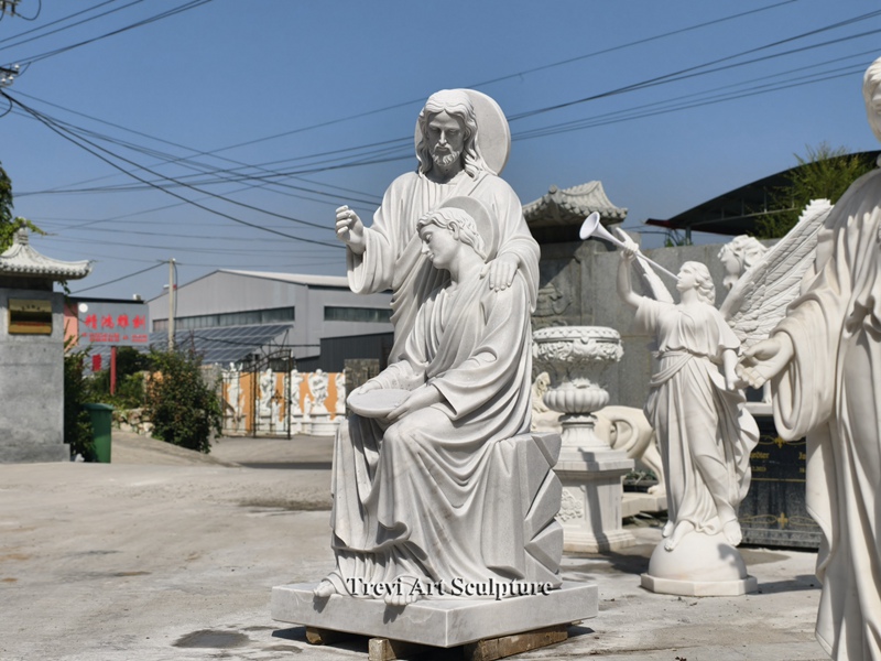 christ and saint john statue