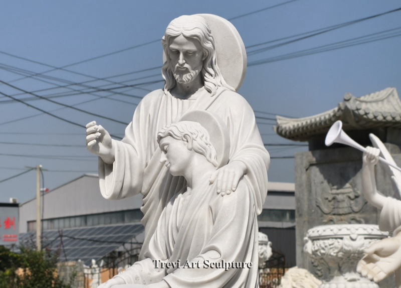 religious christ and saint john statue