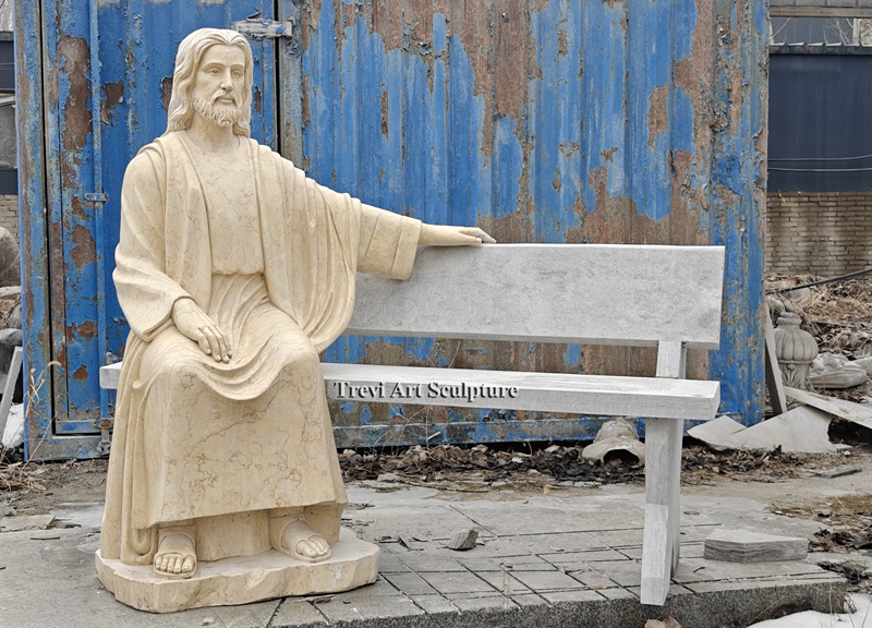 life size marble jesus sitting on a bench sculpture