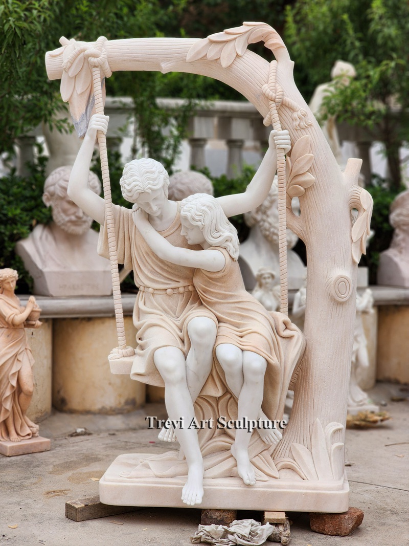 outdoor romantic couple on swing statue