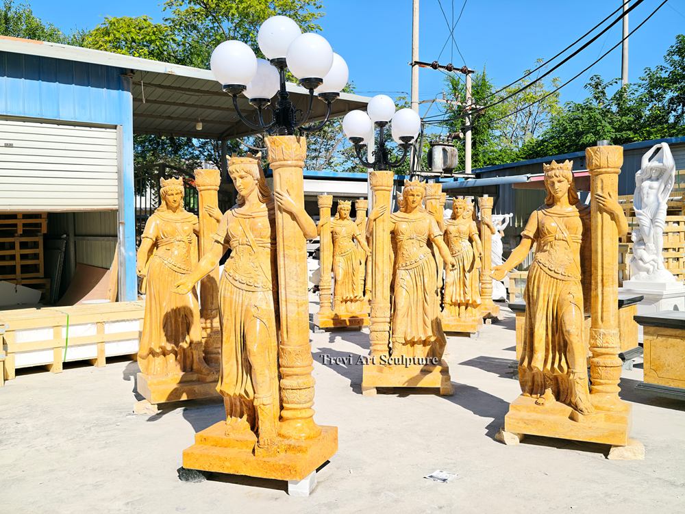 yellow marble female statue lamp post