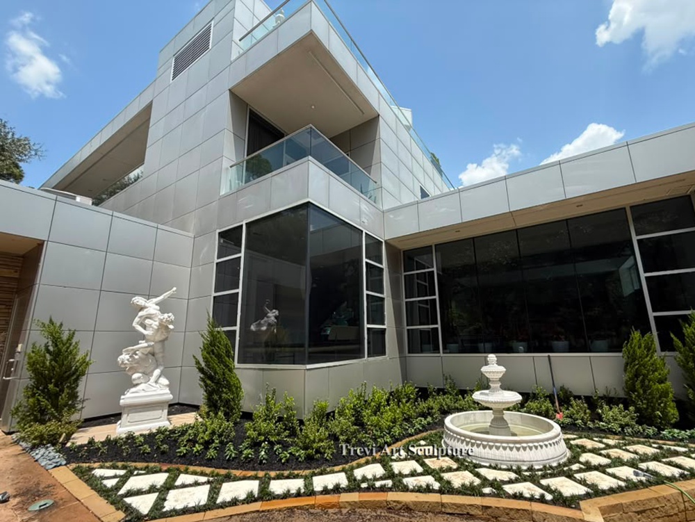 elegant villa courtyard feedback with a marble fountain and the rape of proserpina statue setup