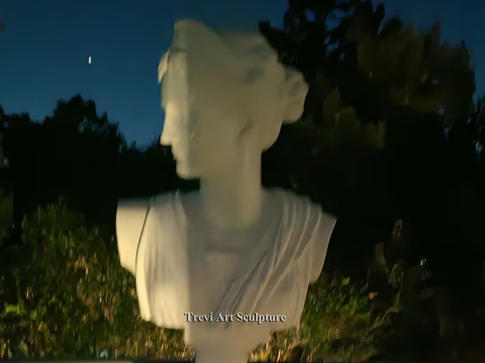 marble bust of diana illuminated at night in the client’s private villa garden